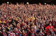 Football fans bring a game to life.